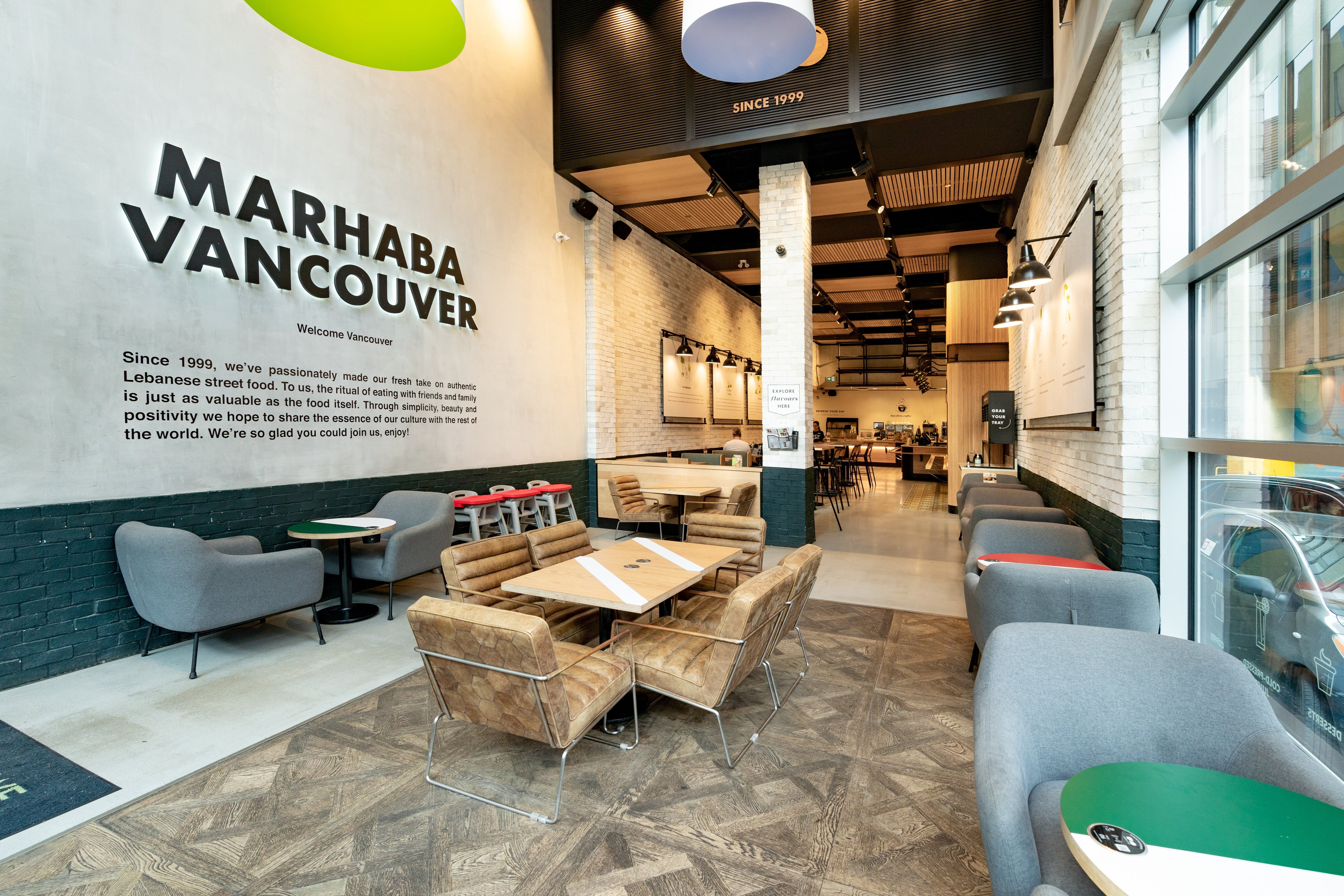 Modern, welcoming interior of Marhaba Vancouver with comfortable seating, natural lighting, and inviting decor.