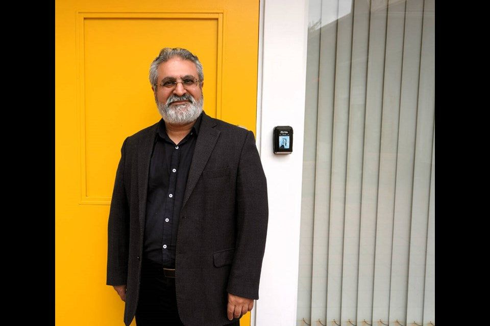 Massoud Karimaei, an Iranian-Canadian calligrapher and engineer recently honoured with the King Charles III Coronation Medal, is set to celebrate Yalda Night with his family in North Vancouver. | Hamid Jafari / North Shore News
